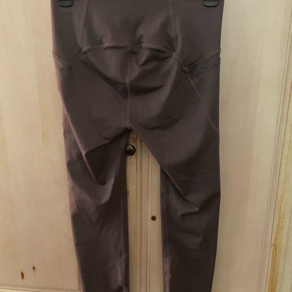 Small, purple with pockets. Like new - Picture 1 of 3
